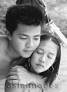 Asia Images Group - Teenage couple embracing