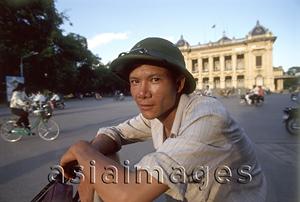 Asia Images Group - Vietnam, Hanoi, pedicab driver in front of Municipal Theatre.