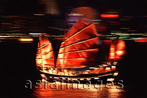 Asia Images Group - China, Hong Kong, Chinese Junk in Hong Kong Harbor at night
