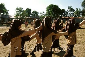 Asia Images Group - Indonesia, Lombok, Muslim girls marching in school.