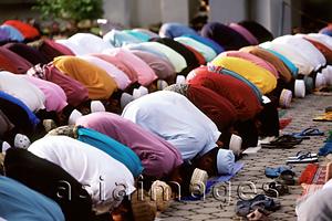 Asia Images Group - Malaysia, Kota Bahru, Muslim men praying at Kubang Kerian Mosque.