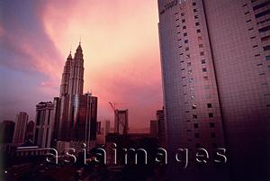 Asia Images Group - Malaysia, Kuala Lumpur, Petronas Towers at dusk.