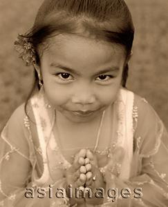 Asia Images Group - Indonesia, Bali, young girl, traditional greeting, portrait, elevated view