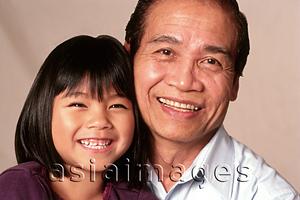 Asia Images Group - Mature man and young girl, portrait