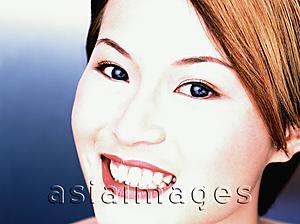 Asia Images Group - Young woman smiling, portrait