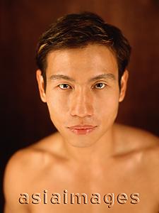 Asia Images Group - Young man, bare chested, portrait