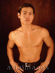 Asia Images Group - Young man, bare chested, portrait