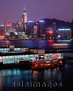 Asia Images Group - Hong Kong, Night view of Wanchai over Star Ferry.