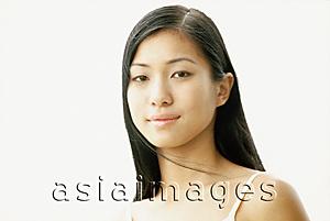 Asia Images Group - Young woman, white background, portrait