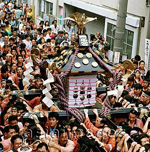 Asia Images Group - Japan, Tokyo, Portable shrine (mikoshi) is carried through the streets during Asakusa Matsuri (religious festival)