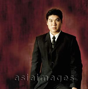 Asia Images Group - Man in suit, portrait