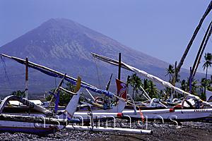 Asia Images Group - Indonesia, Northern Bali, Amed, Boats in foreground, Mt. Agung in background.