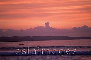Asia Images Group - Indonesia, Bali, Kuta, Sunset over ocean, small boat in water