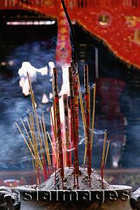 Asia Images Group - Vietnam, incense in a temple