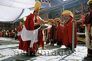 Asia Images Group - China, Szechuan (Sichuan), Kham region, Monks at ceremony performing lama dance.