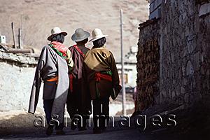 Asia Images Group - China, Szechuan (Sichuan), Kham region, Khampa men walking through village.