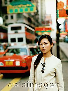 Asia Images Group - Portrait of female executive on street.