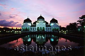 Asia Images Group - Indonesia, Aceh, Banda Aceh, sunset behind Baiturrahman Great Mosque.
