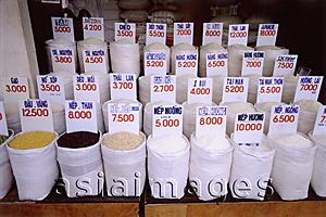 Asia Images Group - Vietnam, Ho Chi Minh City, rice and other grains for sale.