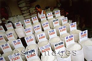 Asia Images Group - Vietnam, Ho Chi Minh City, rice and other grains for sale.