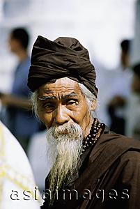 Asia Images Group - Myanmar (Burma), Yangon (Rangoon), Portrait of elderly man at Shwedagon Pagoda