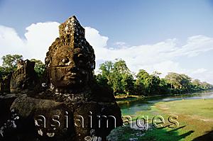 Asia Images Group - Cambodia, Siem Reap, A statue in Angkor