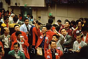 Asia Images Group - Singapore, Traders on the Exchange Trading Floor of the Singapore Stock Exchange.