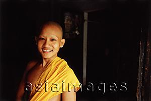 Asia Images Group - Vietnam, Mekong Delta region, Chau Duc, Buddhist monk of Khmer origin, portrait.