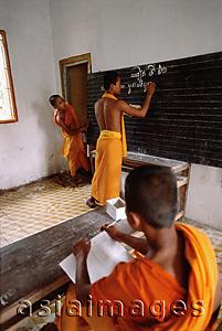 Asia Images Group - Vietnam, Mekong Delta region, Bac Lieu, Buddhist monks in classroom.
