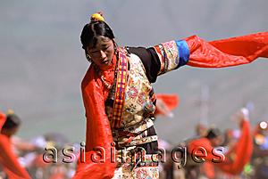 Asia Images Group - China, Szechuan (Sichuan), Kham region, Tibetan dancers performing at festival.