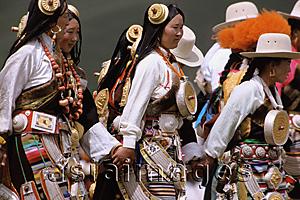Asia Images Group - China, Szechuan (Sichuan), Kham region, Nomad women dancing in traditional clothes.