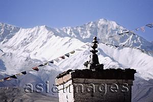 Asia Images Group - Nepal, Mustang, Ancient chortens, mountains in background.