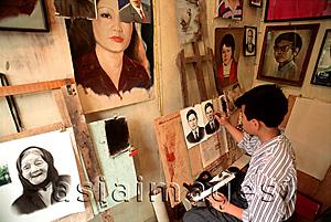 Asia Images Group - Vietnam, Hanoi, man painting in studio
