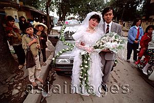 Asia Images Group - Vietnam, Hanoi, couple in wedding attire