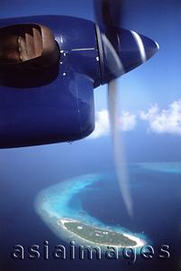 Asia Images Group - Maldives, Kunfunadhoo atoll, Soneva Fushi, flying over Maldives in seaplane. (grainy)