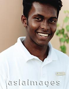 Asia Images Group - Maldives, Kuda Huraa atoll, Four Seasons Resort, Portrait of Indian Spa attendant.