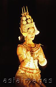 Asia Images Group - Cambodia, Angkor, Traditional Khmer dancer in full costume at Preah Khan Temple.