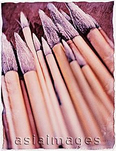 Asia Images Group - Chinese bamboo ink brushes on wood, close-up