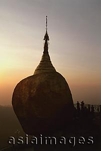 Asia Images Group - Myanmar (Burma), Kyaiktiyo, Worshippers at 'golden rock' at sunset.