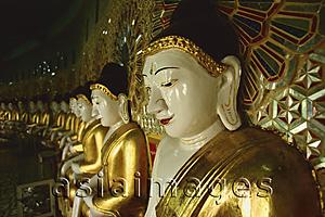 Asia Images Group - Myanmar (Burma), Sangaing Hills, Mandalay, Line of Buddha statues at Onhmin Thonze.