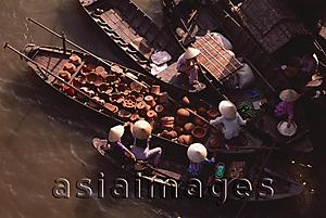 Asia Images Group - Vietnam, Can Tho, Hau river, Earthenware seller and other boats, floating market.