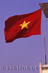 Asia Images Group - Vietnam, Ho Chi Minh city, Vietnamese flag at Ben Thanh market.
