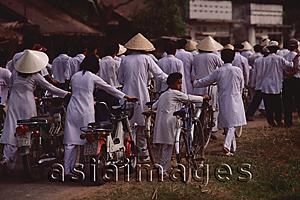 Asia Images Group - Vietnam, Tay Ninh, Caodist devotees returning home after funeral.