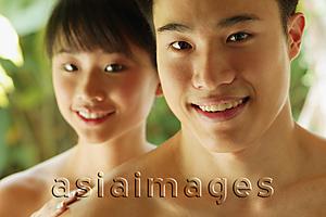 Asia Images Group - Couple looking at camera, smiling