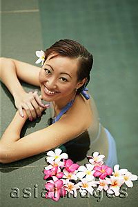Asia Images Group - Young woman in a  swimming pool, high angle view