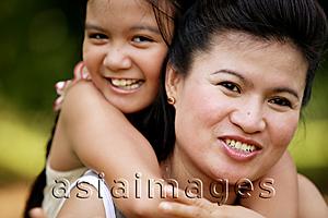 Asia Images Group - Daughter hugging mother, smiling