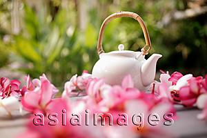 Asia Images Group - Still life of teapot surrounded by flowers