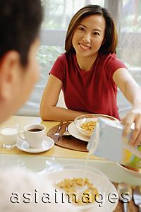 Asia Images Group - Couple having breakfast.