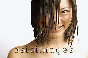 Asia Images Group - Young woman with wet hair, smiling at camera
