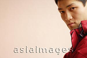 Asia Images Group - Young man looking at camera